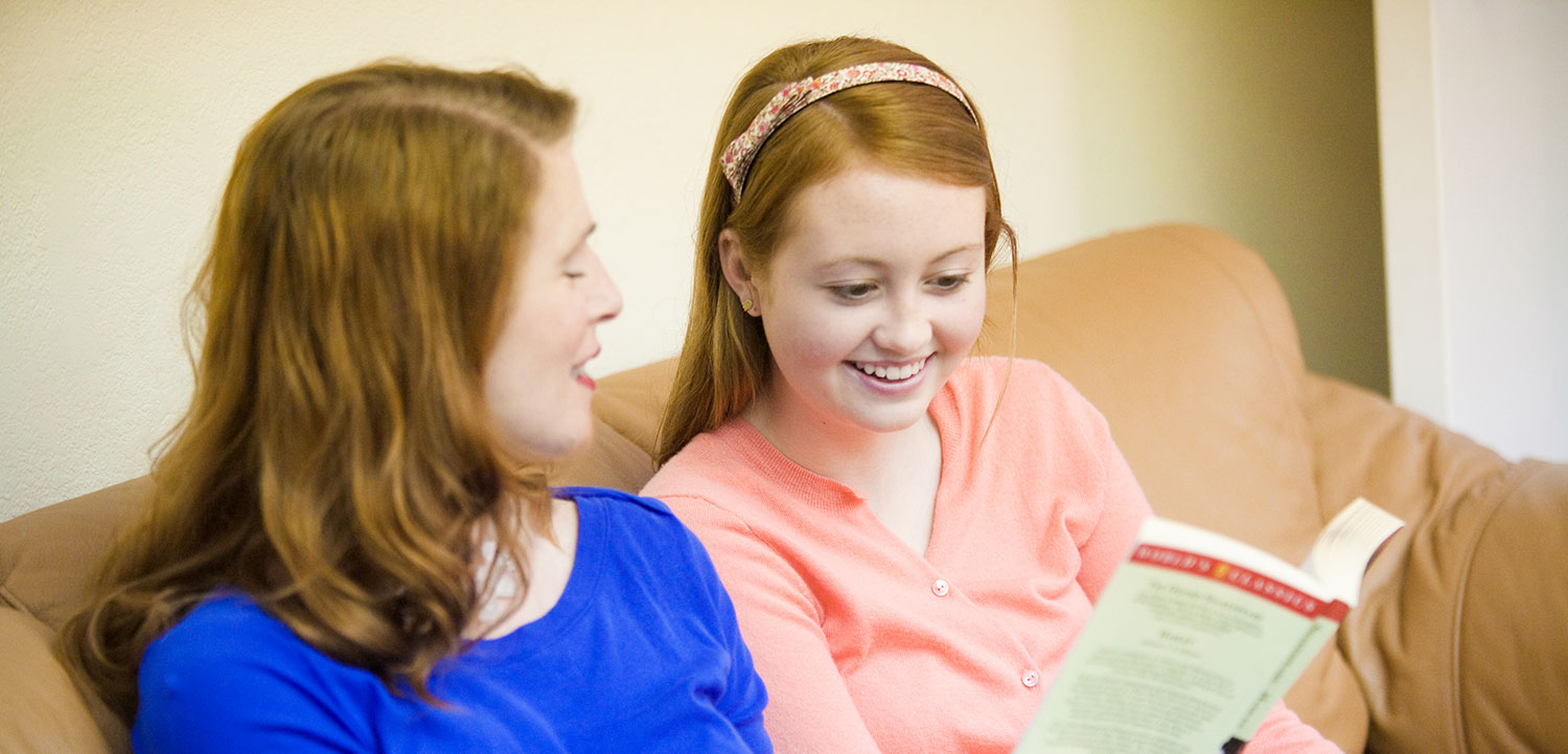 tutor and student reading