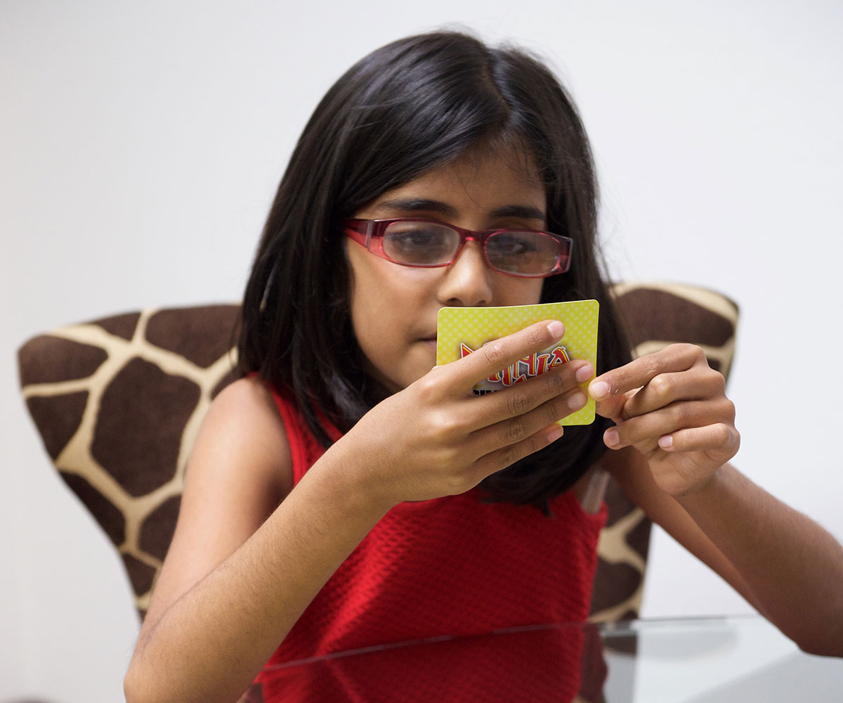 student playing board game